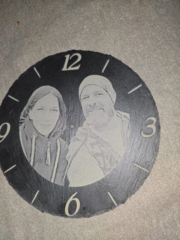 fotogravur schiefer uhr paar